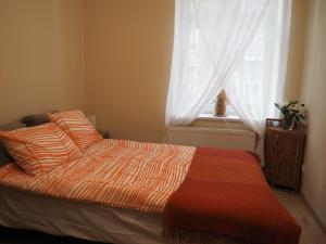 Posteľ alebo postele v izbe v ubytovaní Grand-Tourist Apartments - Anker
