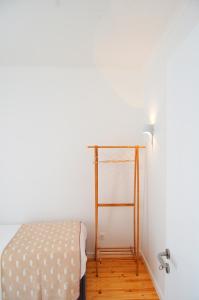 Katil atau katil-katil dalam bilik di Verde'Água Family Home
