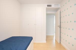 Postel nebo postele na pokoji v ubytování Seafront Duna Beach Luxury Apartment + 33 fotografií
