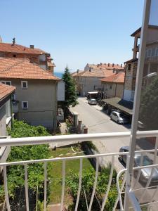 a view of a street from a balcony at Guest House Taligarov in Pomorie