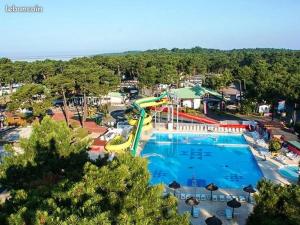 an overhead view of a water park with a water slide at Camping la Palmyre in Les Mathes