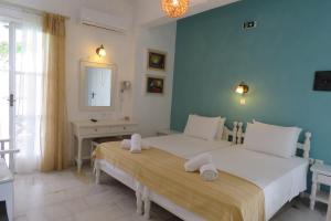 Krevet ili kreveti u jedinici u okviru objekta Corali Beach Hotel