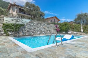 Bazén v ubytování Apartment Sant Agata-6 - Tremezzina nebo v jeho okolí