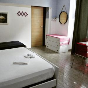 Postel nebo postele na pokoji v ubytování My Room Roma