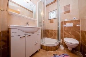 Ванная комната в Paradise Apartments +37 фотографий