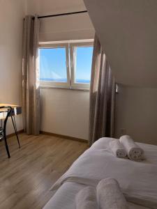 Postel nebo postele na pokoji v ubytování Penthouses Panorama
