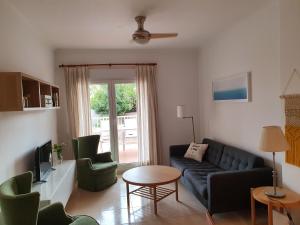 Posedenie v ubytovaní Fantastico bajo con Jardin en Playa de Canet