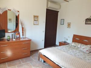 Katil atau katil-katil dalam bilik di Agriturismo Diaccialone