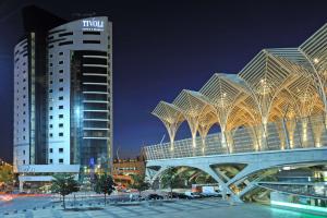a large building with a lot of tall buildings at Tivoli Oriente Hotel in Lisbon