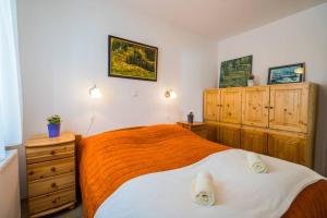 Posteľ alebo postele v izbe v ubytovaní Gemini Apartments II