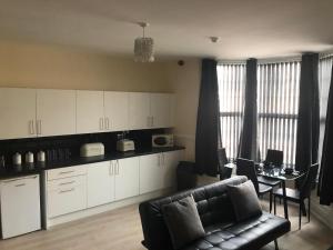 Dapur atau dapur kecil di Sandy Pad's Apartments