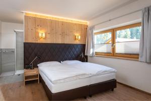 Łóżko lub łóżka w pokoju w obiekcie CHALET MONTIS