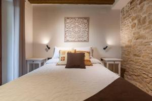 A bed or beds in a room at El Gresol - Naturaleza y Relax
