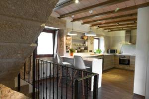 A kitchen or kitchenette at El Gresol - Naturaleza y Relax
