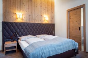 Łóżko lub łóżka w pokoju w obiekcie CHALET MONTIS