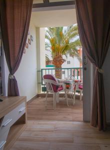 Balkón nebo terasa v ubytování EL CARMEN beach apartment