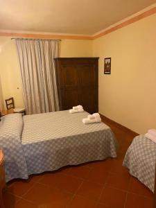 Säng eller sängar i ett rum på Tenuta degli Obizzi