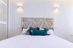 Postel nebo postele na pokoji v ubytování Benalmádena, Estudio Aloha Playa vacaciones en el mar + 9 fotografií