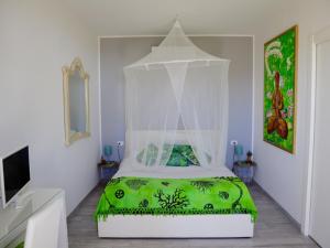 Cama o camas de una habitación en Villa Tropical