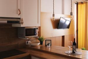 A kitchen or kitchenette at Island Friendly Holiday Home