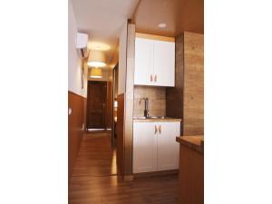 A kitchen or kitchenette at Island Friendly Holiday Home