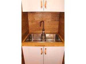 A kitchen or kitchenette at Island Friendly Holiday Home