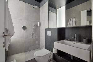 Ванная комната в Atmosfera Hotel
