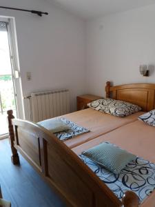 Postel nebo postele na pokoji v ubytování Ferienhaus Zlata