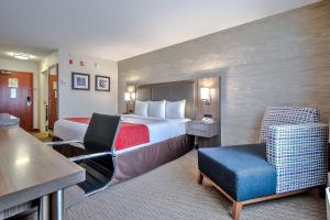 Postel nebo postele na pokoji v ubytování Comfort Inn & Suites South