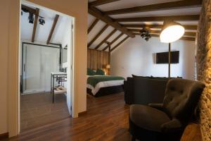 Postel nebo postele na pokoji v ubytování Casa Xiana