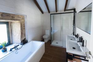 Koupelna v ubytování Casa Xiana