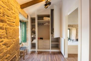 Postel nebo postele na pokoji v ubytování Casa Xiana