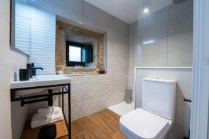 Koupelna v ubytování Casa Xiana + 17 fotografií