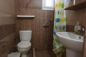 Koupelna v ubytování Kalouda Rooms