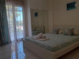 Letto o letti in una camera di Villa Elani