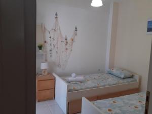 Letto o letti in una camera di Villa Elani