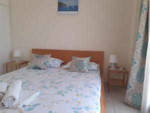 Letto o letti in una camera di Villa Elani