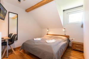 Posteľ alebo postele v izbe v ubytovaní Hotel Landhaus Lungau