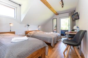 Posteľ alebo postele v izbe v ubytovaní Hotel Landhaus Lungau