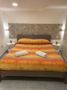 Llit o llits en una habitació de La casetta di Gaia