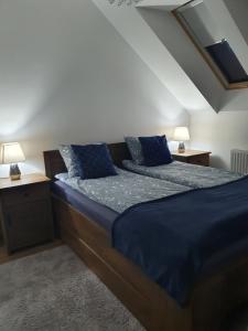 Ένα ή περισσότερα κρεβάτια σε δωμάτιο στο Apartament Platinum
