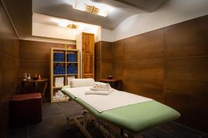 Letto o letti in una camera di Active & Wellness Hotel Subterra