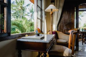 Posezení v ubytování Alam Shanti Ubud