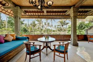 Posezení v ubytování Alam Shanti Ubud