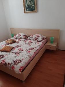 Postel nebo postele na pokoji v ubytování Apartment Greta