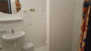 Koupelna v ubytování Hotel Camelot