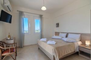 Posteľ alebo postele v izbe v ubytovaní Haravgi 5 bedrooms villa
