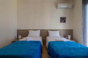 Posteľ alebo postele v izbe v ubytovaní Haravgi 5 bedrooms villa
