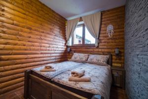 Postel nebo postele na pokoji v ubytování Ranch Jestřebice