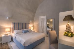 Letto o letti in una camera di Mythical Blue Luxury Suites